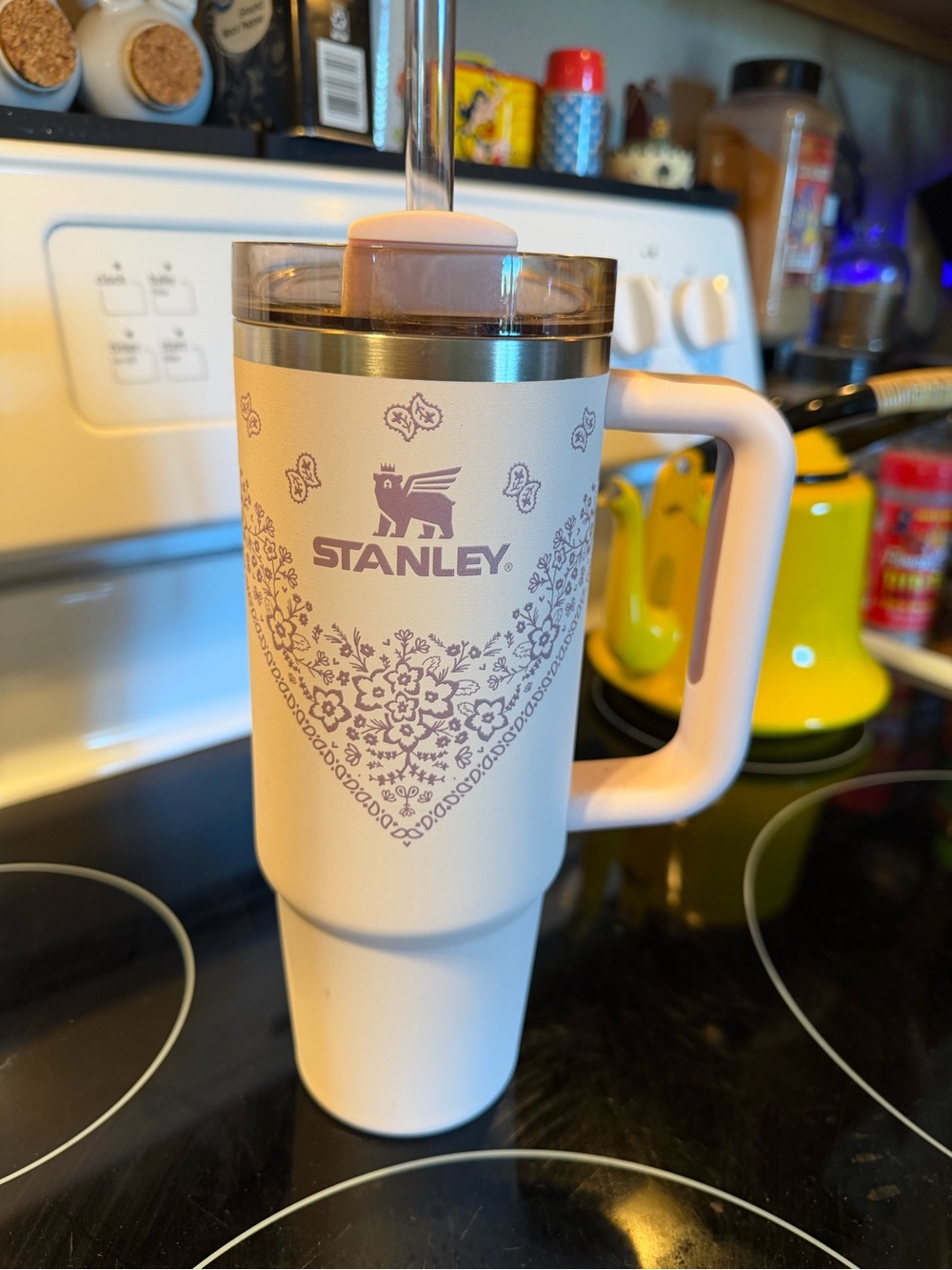Stanley Cream Travel Tumbler with Light Purple Floral Design and Handle